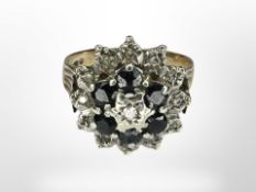 A 9ct gold sapphire and diamond cluster ring, size N CONDITION REPORT: 3.