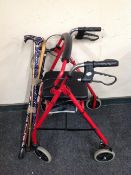 A mobility walking aid and a bundle of walking sticks