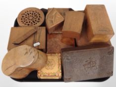 A group of carved wooden boxes, money box, etc.