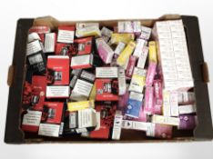 A large quantity of vape e-liquid packs.