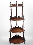 A Victorian style mahogany corner what not stand,