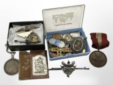 A Scottish silver thistle brooch, religious jewellery, two RAF brooches,