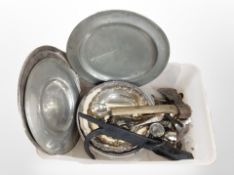 A group of silver plate and pewter dishes and serving trays, together with a vintage hand axe,