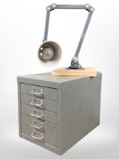 A vintage enamelled metal five-drawer index chest, together with an angle-poise lamp.