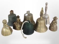 A group of metal handbells.