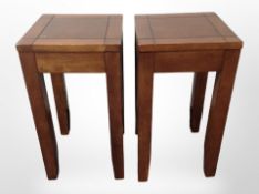 A pair of contemporary hardwood lamp tables, height 54cm.