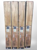 Four packs of Homebase four strip solid wood flooring, each 1 metre squared.