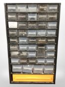 An enamelled metal hardware chest, height 50cm.