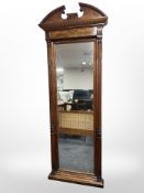 A 19th-century Danish figured walnut floor-standing pier glass mirror with arched pediment,