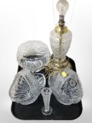 A brass and crystal lamp base, a fruit bowl, two baskets, and a further slender vase.