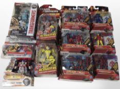 10 Hasbro Iron Man 2 and Transformers figurines, boxed.