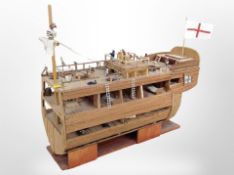 A cross section scale model of an early-19th century battle ship, length 40cm.