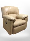 A contemporary stitched tan leather G-plan electric reclining armchair with lead, width 103cm.