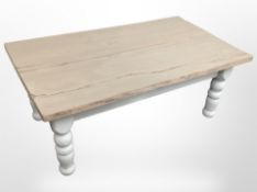 A painted pine rectangular coffee table on turned legs,