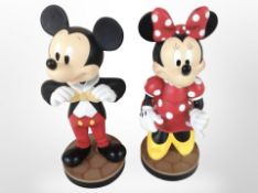 A pair of Disney Mickey Mouse and Minnie Mouse bobble-head figures, height 22cm.