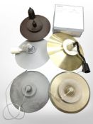 A group of contemporary Scandinavian pendant light fittings.