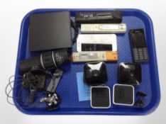 An Apple iPhone, Nokia phone, digital thermometer, Blink cameras, 16x52 monocular,