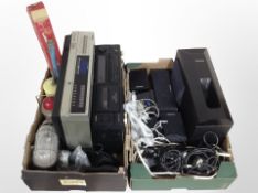 A group of Panasonic surround sound speakers with leads, a Sanyo Betamax video-cassette recorder,