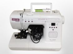 A Decor Pro 99 electric sewing machine, with lead and pedal.