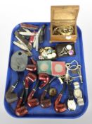 A group of pipes, folding knives, Swiss Army Knife, costume jewellery, wristwatches,