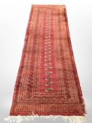 A Turkoman runner, Afghanistan, 302cm x 94cm.