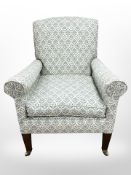A mahogany Dutton armchair by Howard & Sons of London,