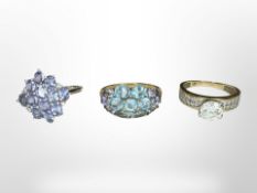 Three 9ct gold rings set with tanzanite and other gemstones CONDITION REPORT: 8.