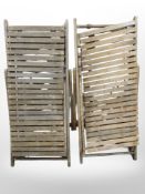 Two teak folding garden chairs.