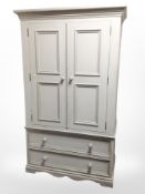 A French style painted pine double door wardrobe,