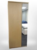 A contemporary MDF bedroom suite comrpising mirrored wardrobe, three-drawer chest,