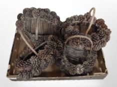 Four rustic pinecone baskets, and a quantity of hessian sacks.