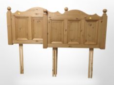 A pair of contemporary pine three-foot headboards.