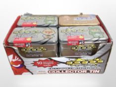Eight Gogo's figurine tins, sealed in cellophane.