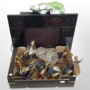 A contemporary electric fire and group of light fixtures