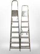 Two aluminium step ladders.