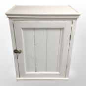 A Victorian painted pine single door kitchen cupboard,