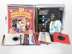 A group of vinyl LP records and 45 singles including Shirley Bassey, Boney M, Elvis Presley, etc.