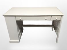 A contemporary painted single pedestal desk fitted two drawers,