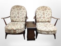 A pair of Ercol stained elm lounge chairs,