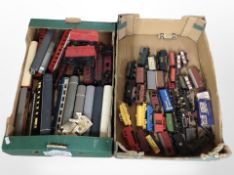 A collection of OO gauge rolling stock including engines, passenger cars, tenders, etc.