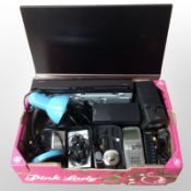 A group of electricals including Bose speakers, Asus monitor, angle-poise lamp,