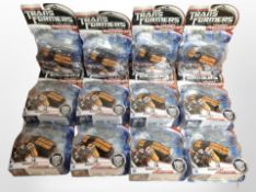 11 Hasbro Transformers figurines, boxed.