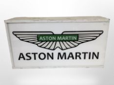 An Aston Martin illuminated sign, width 60cm.