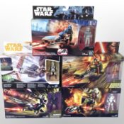 Five Hasbro Disney Star Wars figurines including Imperial Speeder, Assault Walker, etc., boxed.