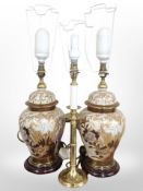 A pair of contemporary oriental earthenware lamp bases, and a further brass example,