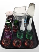 A group of Scandinavian coloured-glass tealight holders, vases, etc.