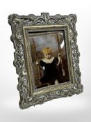 A Victorian crystoleum in ornate brass easel frame, height 19cm.