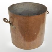 A large 19th century copper and brass twin handled pot height 46 cm