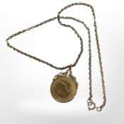 An Elizabeth II full gold sovereign 1966 in 9ct gold mount on chain CONDITION REPORT: