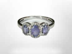 A 9ct white gold tanzanite cluster ring, size P CONDITION REPORT: 2.
